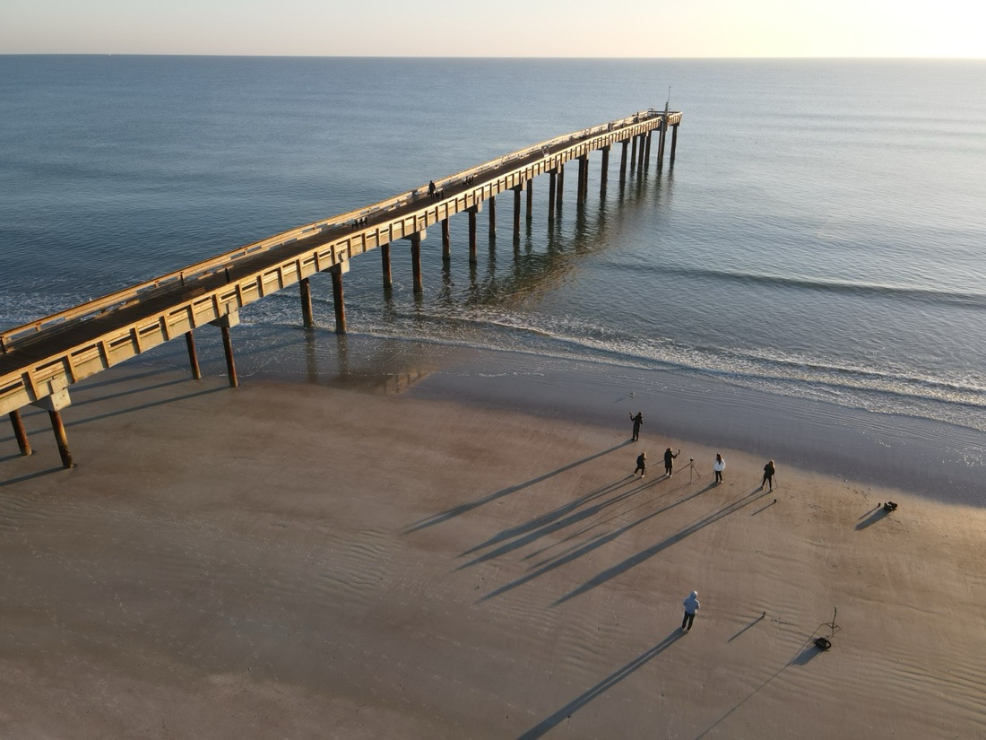 Comunidad fotográfica en la playa